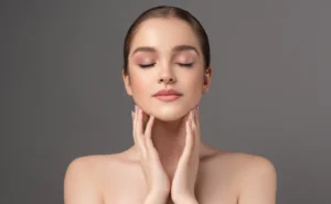 Woman with smooth glowing skin after microneedling.