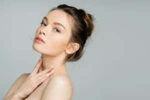 Woman with glowing skin after IPL treatment.